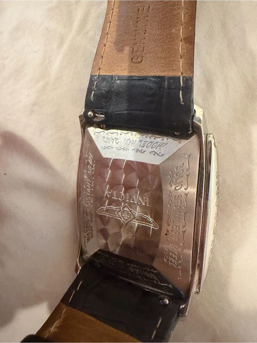 Invicta Men’s Silver Case Watch with Black Leather Strap Model 4224